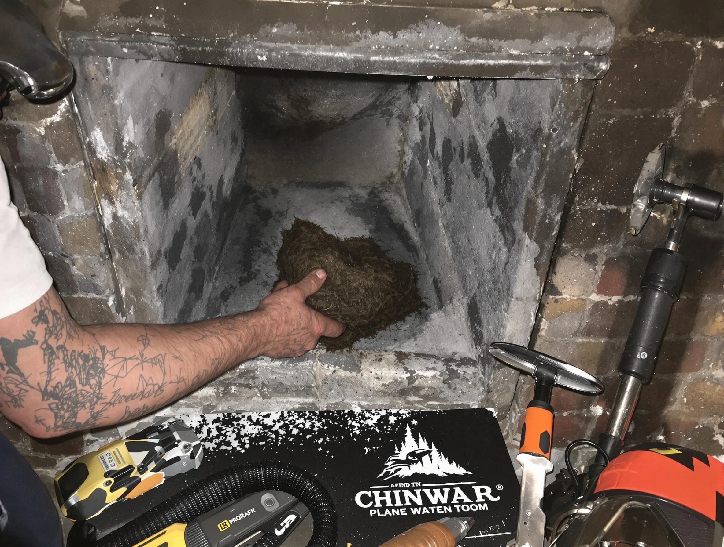 Chattahoochee Hills Chimney Sweep safely removing debris and screening chimney in Chattahoochee Hills, GA